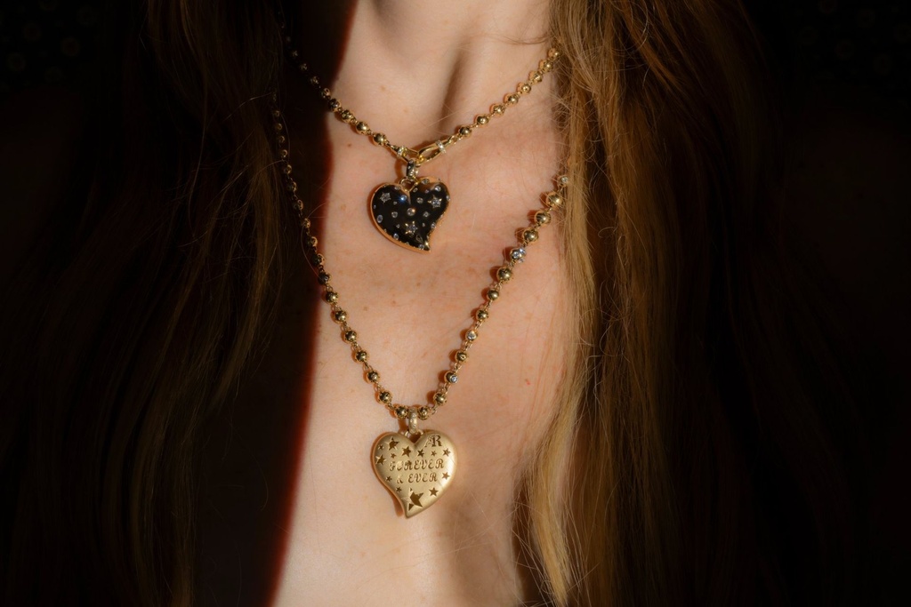 Model wearing Wild at Heart necklaces